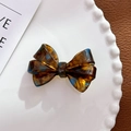Vintage tortoiseshell resin bow hair clip displayed on a decorative ceramic dish - Duckbill Hair Clips / 5.4cm / Caramel Coffee-Duckbill Clip