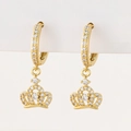 Close-up of golden crown earrings with micro-paved cubic zirconia on white display - N-Crown