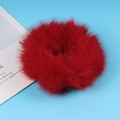 Elastic plush hair scrunchie in vibrant red faux fur for stylish ponytail styling - Red