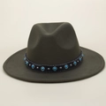 Close-up of olive green fedora with black leather band and turquoise stone studs - M (56-58cm) / Green