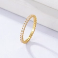 Close-up of gold 925 sterling silver ring featuring a full circle of micro-pave cubic zirconia - US 5 / Gold
