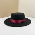 Close-up of a black wool boater hat featuring a burgundy grosgrain ribbon trim detail - M (56-58cm) / Black (Wine Red Ribbon)