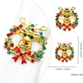Detail view of a golden reindeer napkin ring with colorful rhinestones and size labels - Reindeer with Bow (5)
