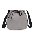 Gray drawstring bucket bag in lightweight nylon fabric with adjustable black webbing strap - Light Gray
