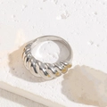 Elegant chunky silver croissant twisted ring displayed on a natural stone base - US6 / Croissant (Platinum Tone)