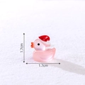 Mini pink translucent Christmas duck figurine with red hat for DIY holiday decor - Luminous Pink