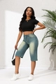 Fashionable blue denim Bermuda shorts paired with a slim black crop top on a model - S / Teal