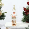 Detail of skiing Santa Claus ornament with gold sequin hat and wooden ski accessories - Gold Skiing Style