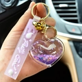 Cute heart-shaped liquid quicksand keychain with purple glitter gold bell and strap - Purple