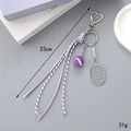 Porte-clés de tennis avec balle violette et cordon tressé, longueur 23cm et poids 31g - Violet (K4699)
