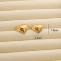 Golden 18K titanium steel heart stud earrings with faceted texture on a velvet stand - R194 Faceted Heart / Gold