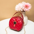 Chic red circular crossbody bag with quilted pattern and gold chain strap and cat charm - Red