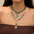 Detail of layered bohemian necklace with turquoise beads and silver cactus pendant - 3-Layer Suede Cord Waterdrop Cactus Turquoise Style