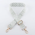 Detail of adjustable green and white embroidered chevron strap with gold metal hardware - Light Gold Buckle / Matcha Green