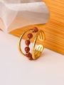 Detailed view of adjustable gold-plated ring with hammer texture and brown sandstone beads - Adjustable Open / Brown