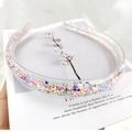Close-up of transparent hairband filled with colorful heart sequins and non-slip teeth - Sequin Heart Style