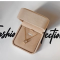 Detailed top view of gold square zircon necklace inside a beige velvet jewelry gift box - 7x7 Medium Pendant Box / Apricot