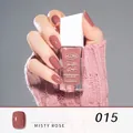 KUDAN Mist Rose 015 nail polish in dry rose shade on hand with 10ml bottle - 15#Misty Rose