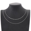 Minimalist silver double-layered stainless steel O-chain necklace on a black mannequin - Silver Double Layer Style (KN201894-Z)