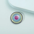 Close-up of a round mandala pattern fridge magnet with colorful crystal glass finish - Style 6/Purple Tone Mandala