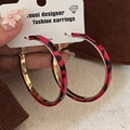 Macro detail of red leopard print hoop earrings with golden inner lining and branding - Red Leopard (3# Silver Needle-Gold-Red)