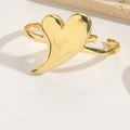 Elegant gold open ring featuring a polished heart-shaped motif on a clean white surface - Irregular Simple Heart Style (RG9107)