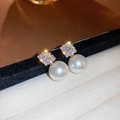 Gold plated pearl earrings with square zirconia studs on a jewelry box background - Gold Pearl-Square (61#)