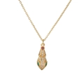 Detailed view of gold plated necklace featuring a snake pendant with red and green zircons - Snake Head