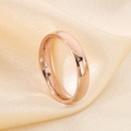 Polished rose gold minimalist titanium ring displayed on champagne satin fabric - US 6 / Men's Minimalist Plain Band Style (KR43443-K) / Rose Gold