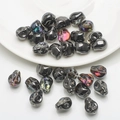 Polished black skull-shaped glass beads for jewelry making with colorful luster finish - Half Gun Black Purple