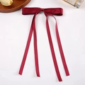 Elegant deep red satin bow hair clip with four long ribbons on a clean background - Burgundy
