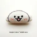 Close-up of white plush dumpling accessory with facial embroidery and 3.8cm height - Dumpling
