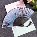 Classical folding fan with black lotus ink painting and butterfly detail with tassel - Pure and Noble - Light Blue Black Handle