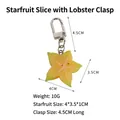 Realistischer Sternfrucht Schlüsselanhänger mit gelbem PVC Anhänger und silberner Schnalle - Tor-Schnalle-Stil