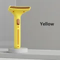 Ergonomic yellow pet deshedding brush with curved metal teeth on a white 3D pedestal - Push-Button Cleaning Thinning Comb / Yellow