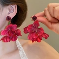Close-up of red fabric flower earrings with green beads and water drop pendants - 3D Flower Red Bead Drop Earrings