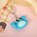 Close-up of a blue silicone cartoon crab keychain with metal ring on a soft gift backdrop - Blue Crab (Keyring)