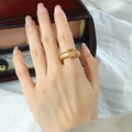 Anello vintage in titanio placcato oro con gemma rettangolare e trama a coste sottili - US 8 / Oro - Pietra di Vetro Champagne