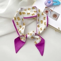 Long silk scarf with yellow numbers and purple trim tied in a decorative knot - Numbers Purple