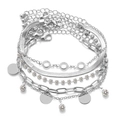 Set di bracciali multistrato argento con strass e ciondoli rotondi su sfondo bianco - Ciondolo di Strass Argento