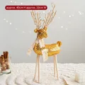 Christmas reindeer decoration with gold sequins and white fringe scarf, height 40cm - Gold Fawn