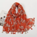 Detail of vibrant orange floral print scarf featuring delicate tassels and cotton-linen texture - Bright Orange White Large Floral Style (XB949)