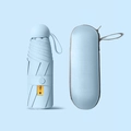 Mini light blue capsule umbrella with UPF50+ protection and matching storage case - Without Box / 8 Ribs Thickened Black Glue / Sky Blue