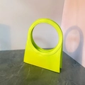 Neon yellow trapezoid handbag with iconic circular metal handle in glossy PU leather finish - Fruit Green
