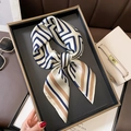 Elegant silk square scarf featuring navy blue and caramel geometric patterns on a tray - 70*70cm / 30120-Navy Caramel Color Block