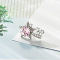 Silver star earrings with pink center zircon and clear stones on blurred background - One Pair With Silicone Earplugs / Rose Pink (A542-4)