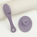 Detailed view of purple silicone face cleanser brush and applicator with suction base - Light Purple