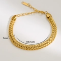 Detail van de 7mm gouden gevlochten kettingarmband met verstelbare 5cm verlenging - 7mm Gouden Tarwevlecht Armband