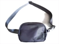 Detail view of water-resistant nylon waist bag with adjustable strap and plastic buckle - Navy Blue (Color Matching)