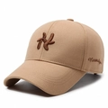 Khaki structured baseball cap featuring 3D letter embroidery and Nostalgia side script - Khaki